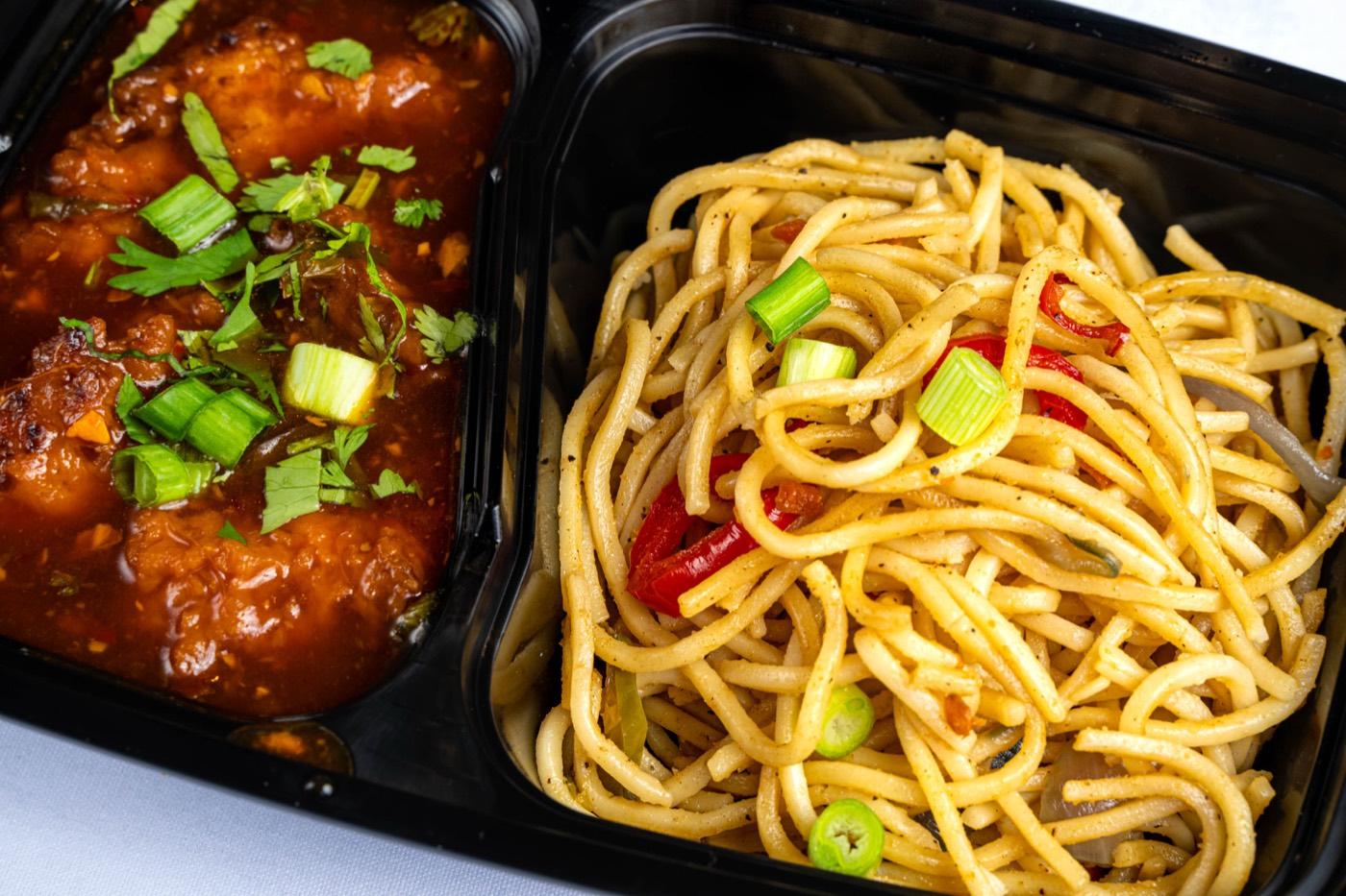 Close-up of Halal chilli chicken and hakka noodles at India 101 in Irving, TX