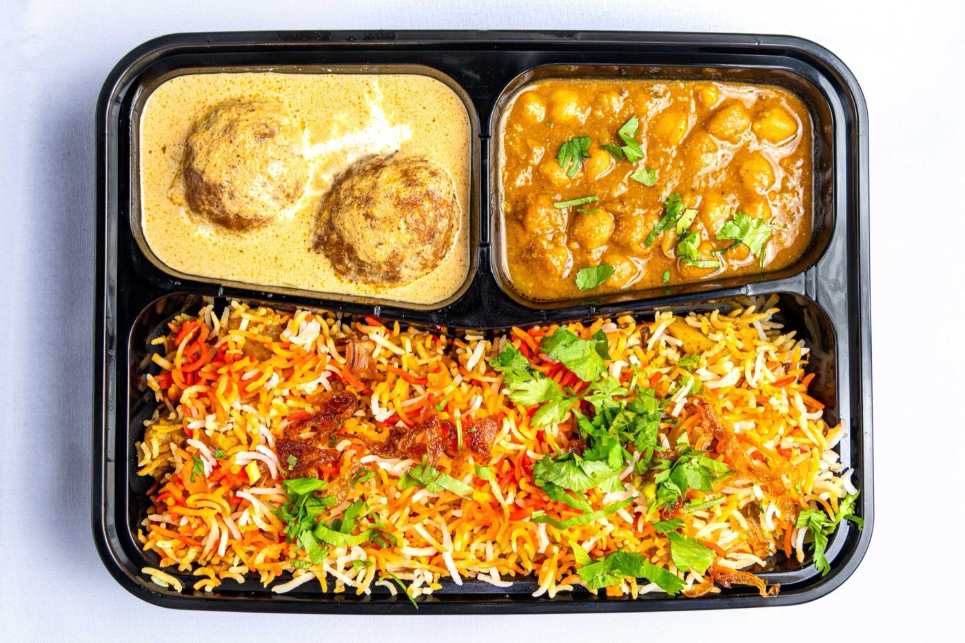 Halal vegetarian malai kofta and chole with biryani takeout at India 101 in Irving, TX