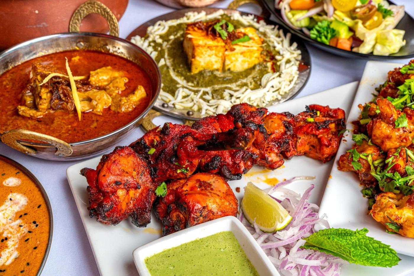 Halal tandoori chicken with palak paneer and curries at India 101 in Irving, TX